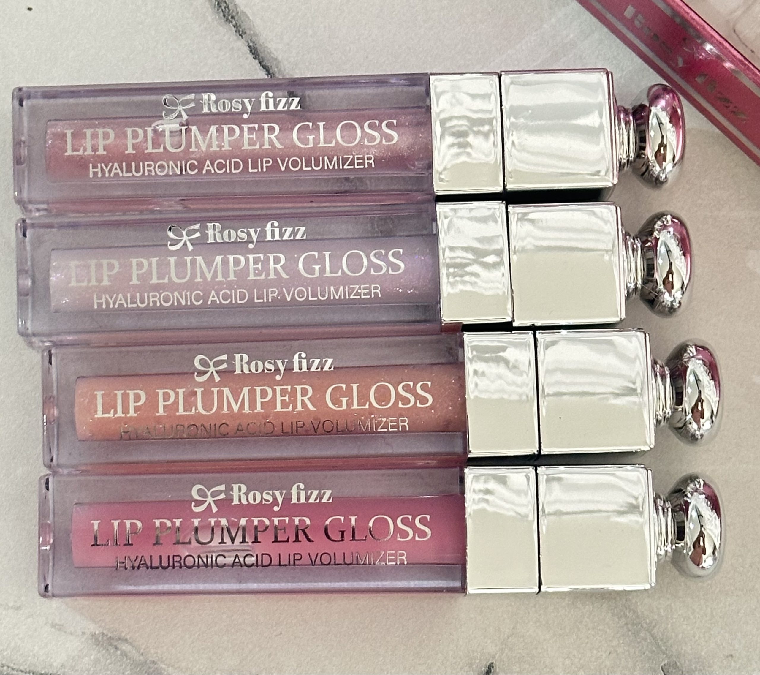 Caja con 24 LipGloss Voluminizador con Ácido Hialuronico Tipo DIOR. Brillo intenso, Efecto volumen, Máxima Hidratación y Humectacion. - Imagen 4