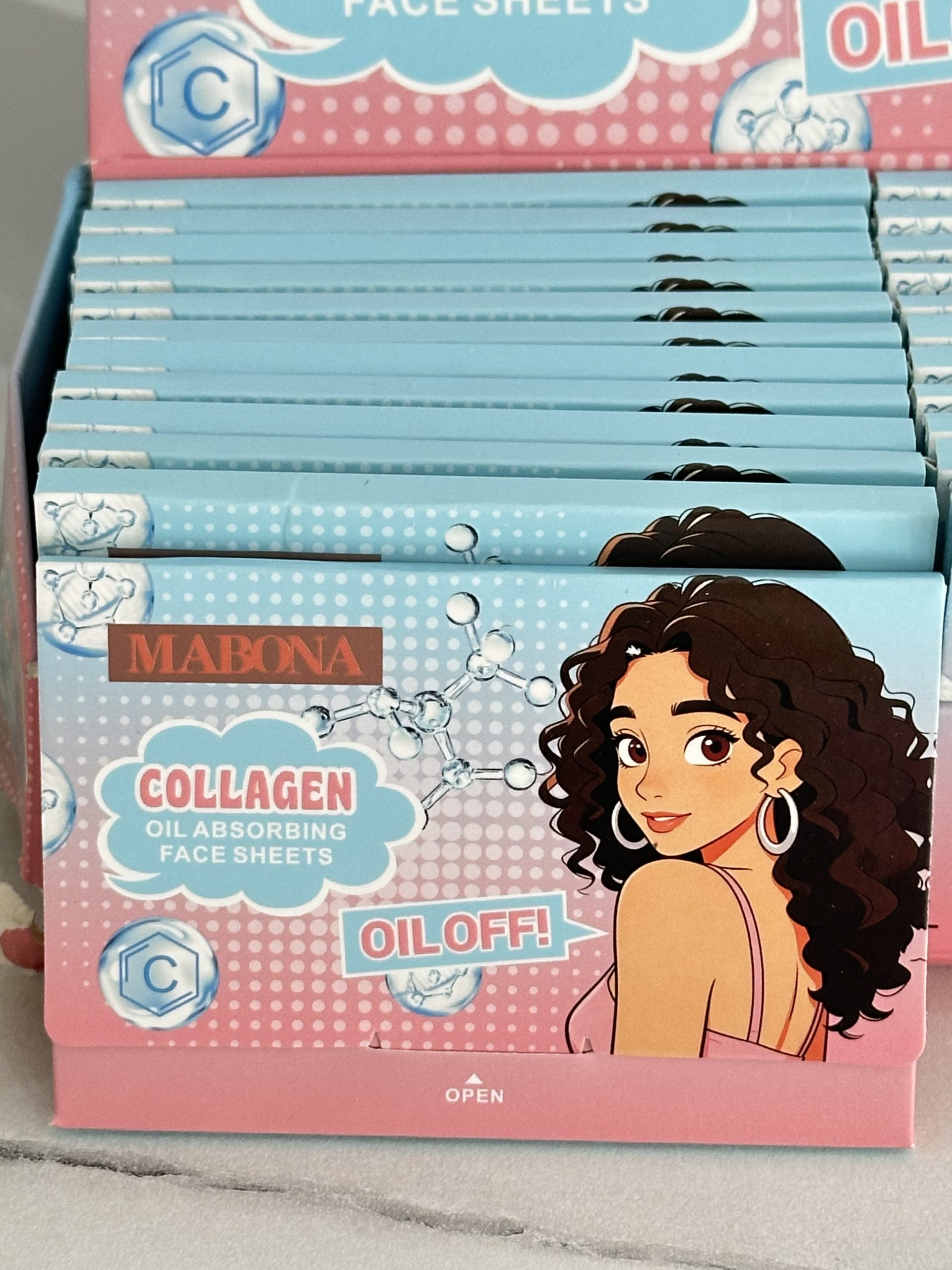 12 Cajitas con 100 Papelitos absorbentes de grasa facial con colágeno, ideales para retirar el exceso de brillo sin maltratar el maquillaje. MABONA - Imagen 2