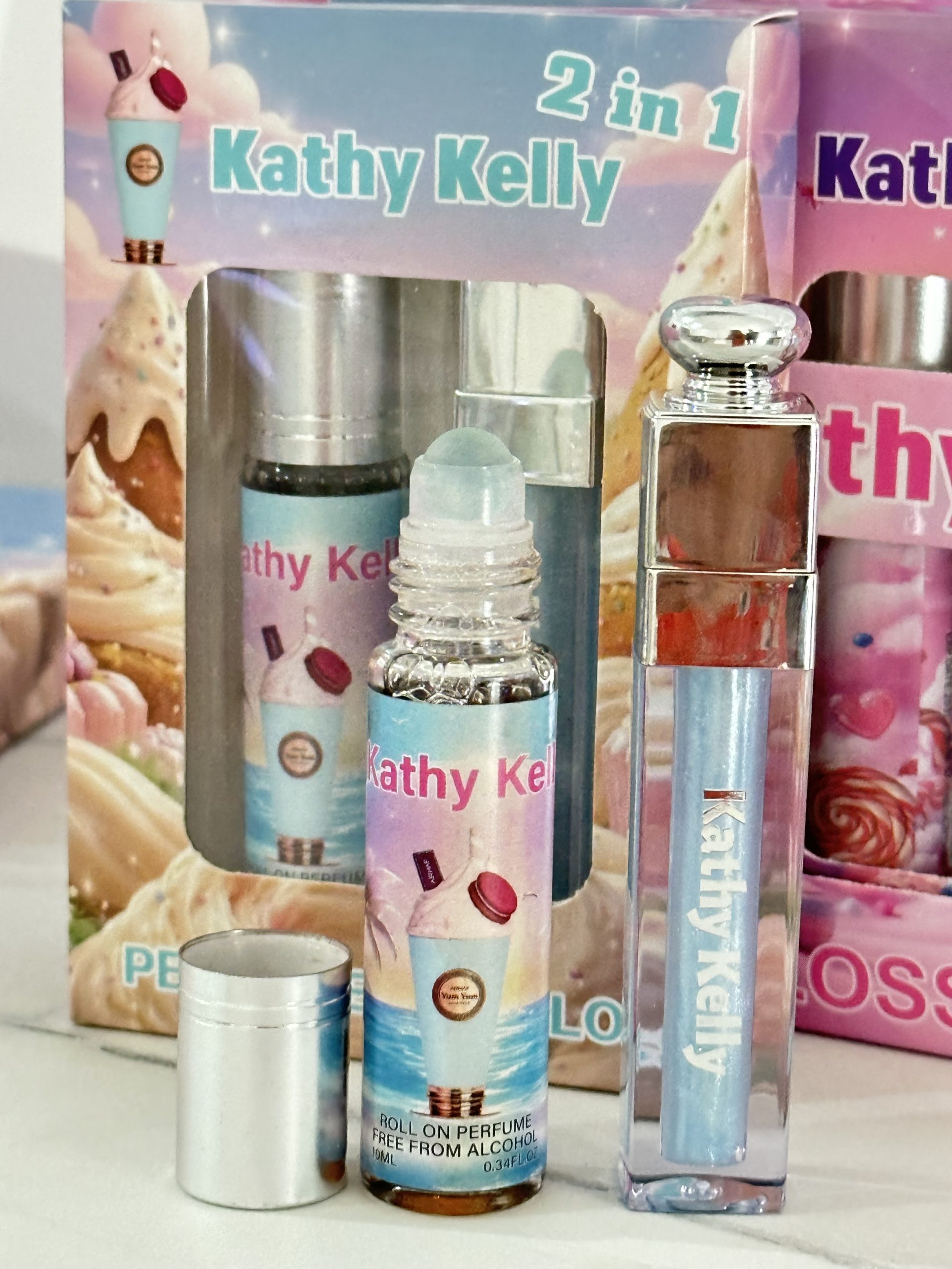 Caja con 12 Duos PERFUME + LIP GLOSS Yum Yum. Kathy Kelly - Imagen 3