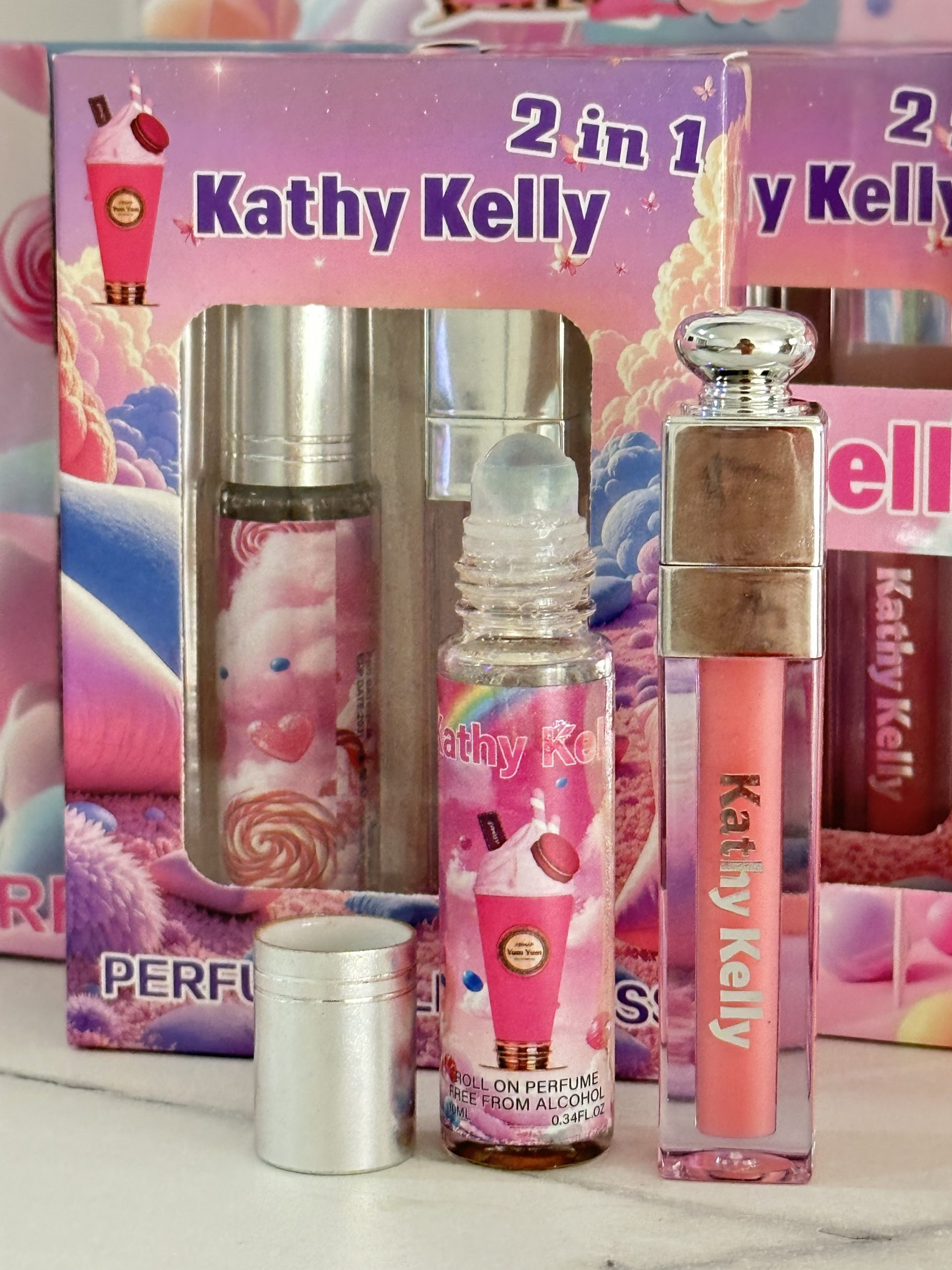 Caja con 12 Duos PERFUME + LIP GLOSS Yum Yum. Kathy Kelly - Imagen 4