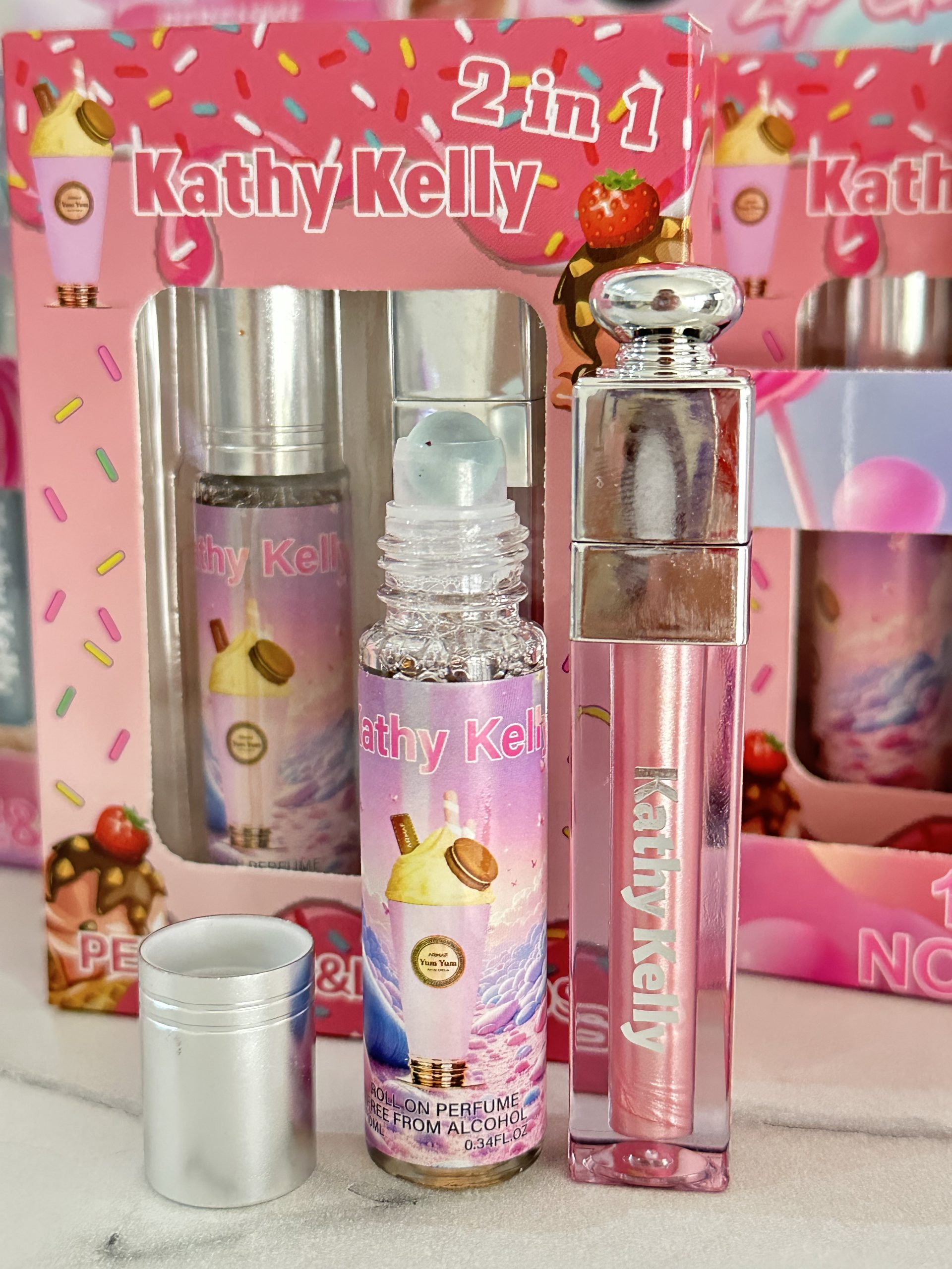 Caja con 12 Duos PERFUME + LIP GLOSS Yum Yum. Kathy Kelly - Imagen 5