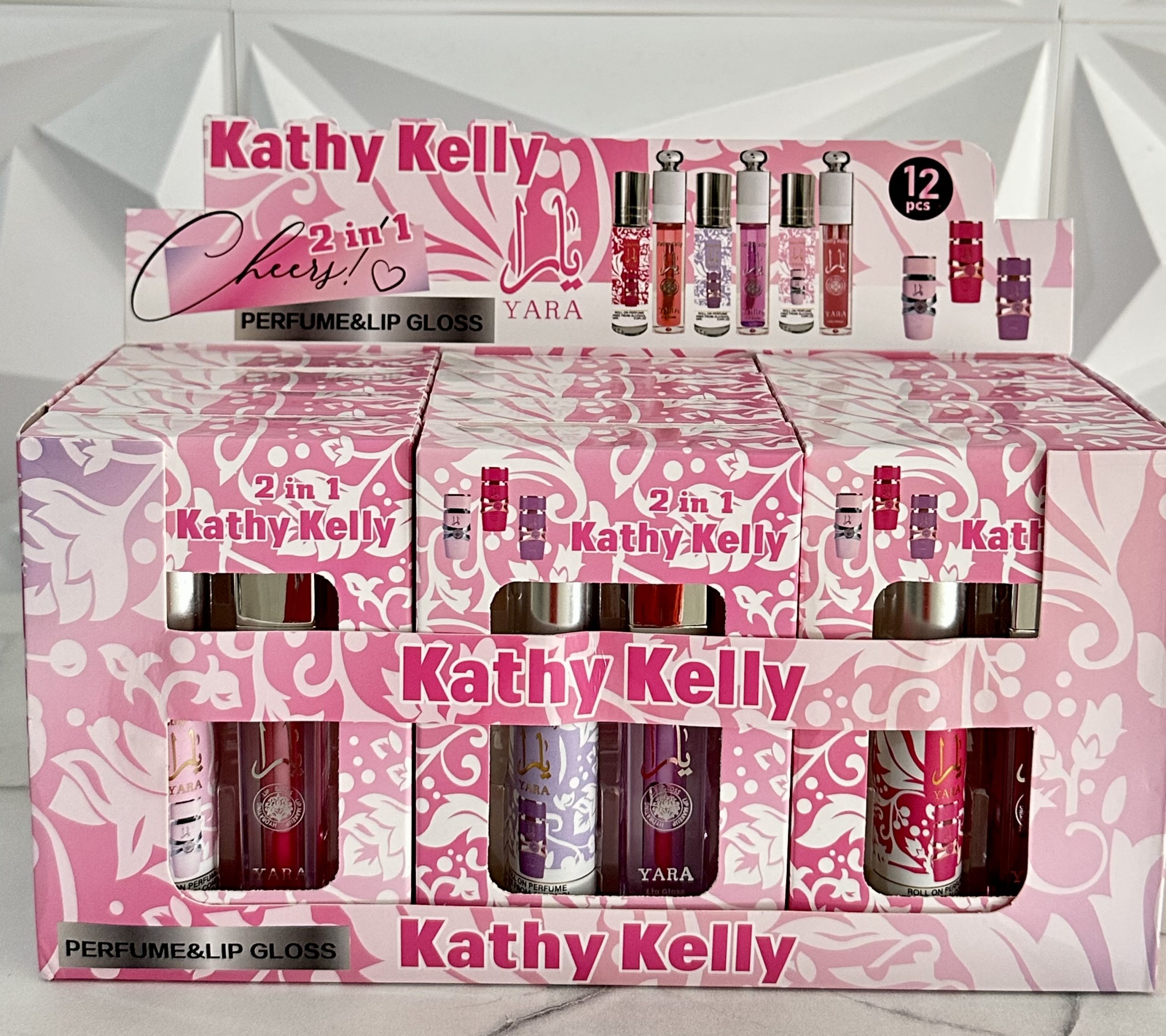 Caja con 12 Duos PERFUME + LIP GLOSS Yara. Kathy Kelly